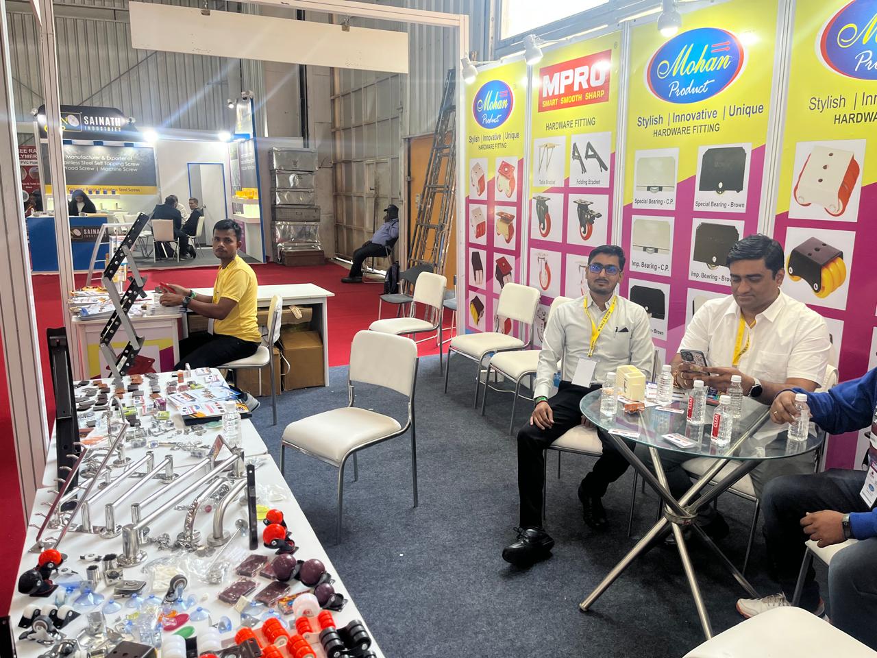 Sample table of castors, wheels and stainless steel bath fittings at the stall